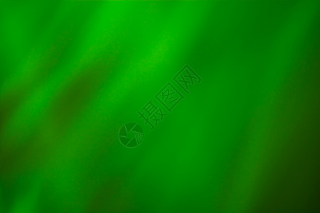 发射状光效绿色阴影中抽象的卷状背景背景