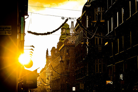 斯德哥尔摩市景和晨光橙子黄色建筑统计资料背景图片