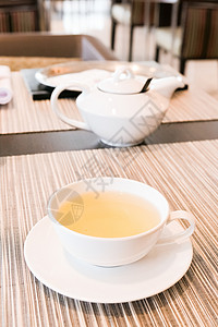 五点在餐馆里吃青草药茶茶具餐厅菜单饮料排毒绿茶花园茶壶草本植物时间背景图片