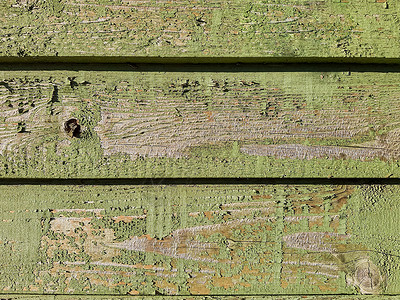 复古木背景纹理与结和钉孔 旧垃圾木板 质朴的背景 横涂绿色面板很常用背景图片