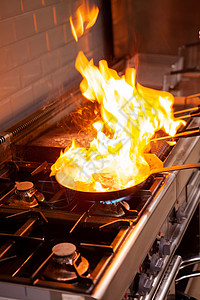 厨房大火烹饪厨师餐饮食物火炉气体用餐酒店餐厅火焰职业油炸烤箱高清图片素材