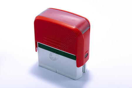 红色 办公室 自动 橡胶印章 白色墨水邮票反射背景图片