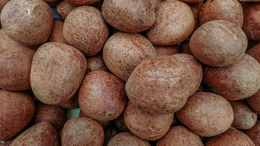 印度食品市场上的椰子皮革情调热带棕色异国背景图片