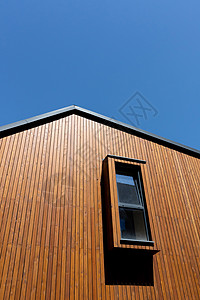 Wooden 木板屋顶 新现代房子的屋顶 有窗户和复制空间背景图片