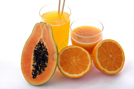 橙汁木瓜一杯橙汁 有切橙子和木瓜背景
