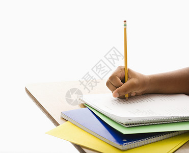 做任务做功课的小孩照片工作室家庭作业水平写作青春期学校课堂工作笔记本背景