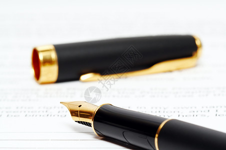 纸上印有文字的墨水笔商业喷泉宏观金融签名笔记文档字母法律办公室古典高清图片素材
