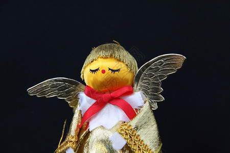 圣诞天使金子翅膀背景图片
