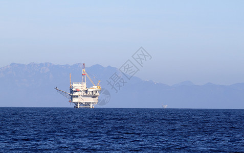 石油钻井机原油力量资源日出汽油生产燃料海浪商业气体背景图片