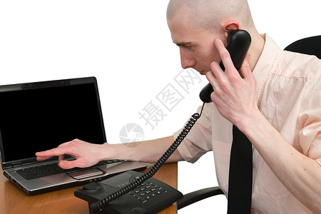 电话和人机笔记本白色男人办公室戒指电脑讲话黑色商业塑料背景图片