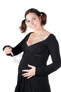 穿黑衣服的漂亮孕妇的肖像肚子黑色母亲身体姿势女孩马尾辫母性微笑腹部背景图片