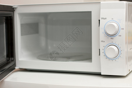 打开烤箱微波白色厨房器具房子物品时间电子产品刻度食物烤箱背景