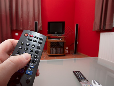 远距离电影娱乐手指电视技术手表闲暇房间控制客厅转动高清图片素材