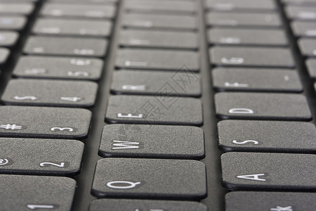 个人笔记本电脑黑色训练电子产品灰色字母键盘背景图片