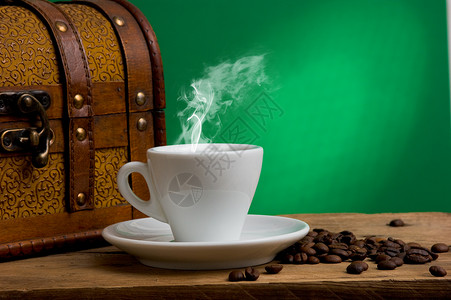咖啡杯桌子绘画黑色广告调度咖啡豆子绿色背景图片