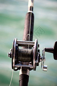 钓鱼碳线素材钓鱼棒运动纺纱海洋闲暇渔夫垂钓者工具娱乐金属夹子背景