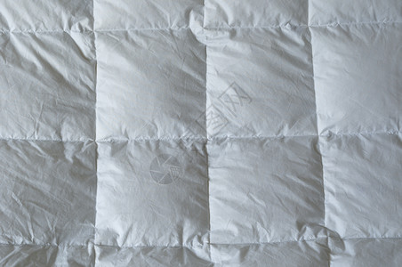 下方舒适器的详情线条枕头棉被羽绒被卧室柔软度织物白色羽毛鸭子背景图片
