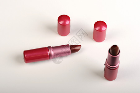 口红红色身体塑料嘴唇女士粉色底漆化妆品背景图片