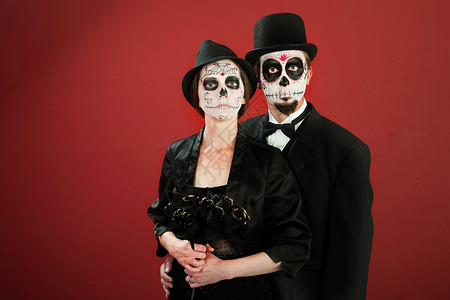 万圣节经典活动迪亚德洛斯穆尔托斯花朵配偶夫妻女士胡须帽子胡子婚姻颅骨两人背景