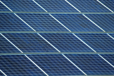 太阳能电池板面板细胞绿色网格光伏发电机力量太阳能板蓝色电气背景图片