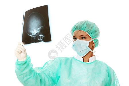 女医生检查头X光照片扫描医院工作放射科x射线诊所保健技术照相外科儿科放射科医生高清图片素材