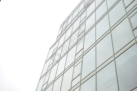 区块天蓝色财富组织中心企业市中心天空建筑学玻璃窗户高清图片