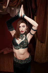 肚皮舞素材美丽的贝贝舞者情调天鹅绒腹部异国姿势文化螺柱手势女士肚脐背景