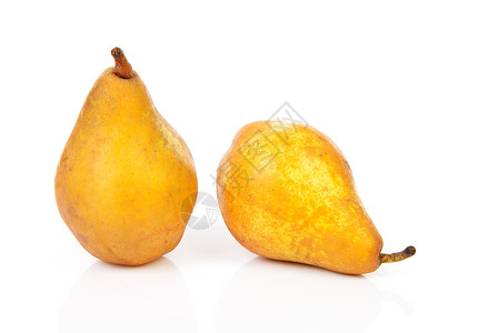 两个新鲜的梨子黄色维生素球状背景图片