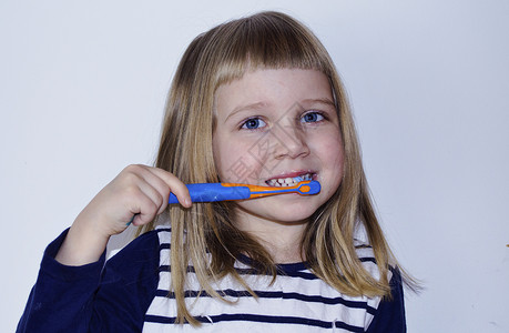 小女孩牙刷牙健康牙齿女孩保健孩子们牙科卫生背景图片