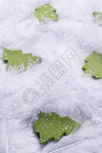 圣诞树星星假期绿色毛毡庆典羽毛背景图片