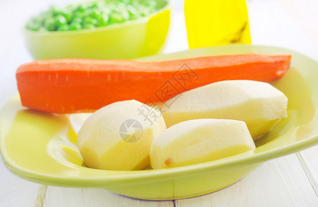 新鲜蔬菜 生土豆和胡萝卜食品墙纸工作室厨房生产饮食市场健康饮食橙子萝卜新鲜食品高清图片素材