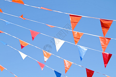 飘扬的旗橙旗 在荷兰庆祝皇后日 在荷兰庆祝王后节背景