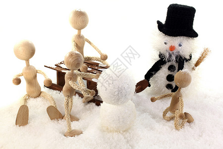 小雪橇家庭造雪人背景