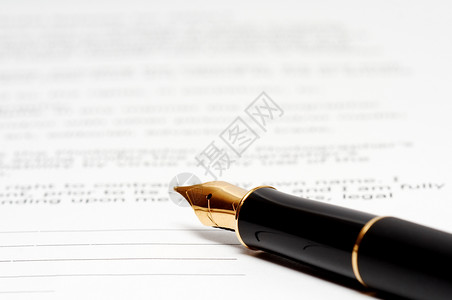 纸上印有文字的墨水笔笔尖成功亲笔报告金子笔记字母打印协议签名文本高清图片素材