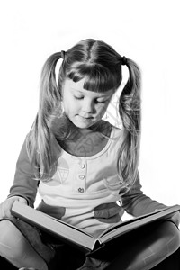 女孩和书女儿教育童年阅读孩子喜悦乐趣学习闲暇背景图片