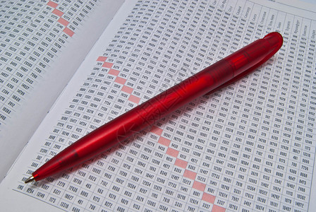 日记上的红色笔背景图片