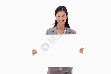 以空白签名板微笑的女商务人士背景图片