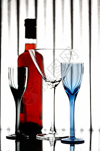 眼镜玻璃杯乐趣白色红色享受瓶子蓝色背景图片