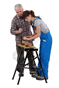 从事木工工作的男女工人帽高清图片素材