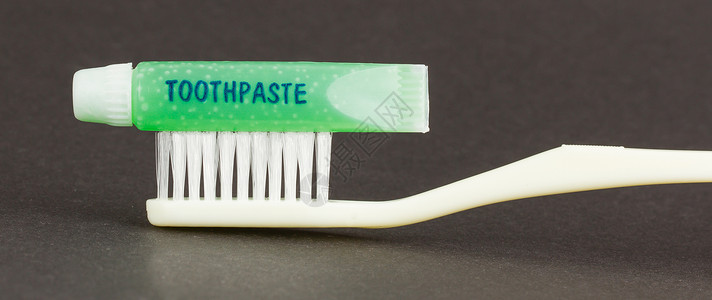 孤立的牙刷和绿牙膏浴室团体空腔牙科刷子牌匾牙医卫生美白塑料背景高清图片素材