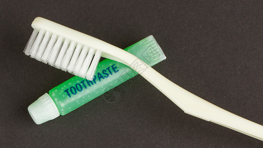 孤立的牙刷和绿牙膏美白空腔刷子细绳团体塑料浴室牌匾卫生牙科黑色的高清图片素材