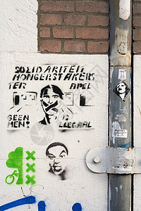 阿姆斯特丹墙上的涂鸦模版讯息艺术散文背景图片