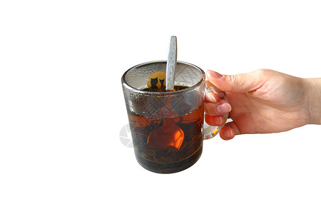 茶杯中的茶早餐指甲液体满足游客治疗勺子金属午餐棕榈背景图片