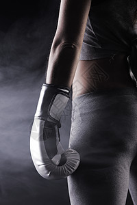 女拳手女孩女子肌肉女性运动运动员手套力量拳击女士背景图片
