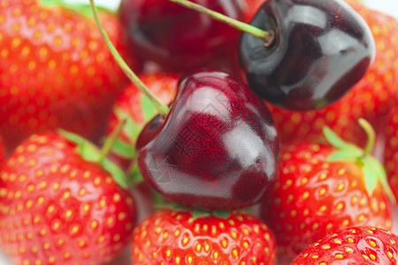 水果樱桃草莓草莓背景上的樱桃树叶生活食物产品红色宏观团体摄影生产水果背景