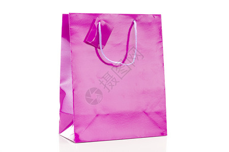 白色背景的单紫色购物袋背景图片