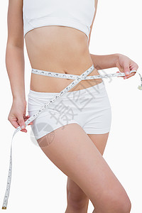 腰部微瘦女人的中产体女士数字饮食测量腹部躯干重量周长节食女性背景图片