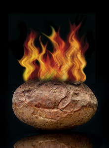 热土豆争议政治厨房危险燃烧健康风险安全火焰蔬菜背景图片