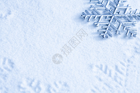 雪花冰晶元素雪上的雪花白色冰晶墙纸饰品薄片水平新年宏观蓝色艺术背景