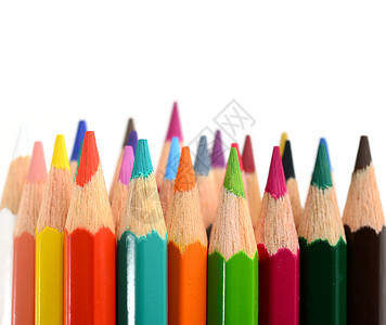 彩色铅笔蜡笔爱好彩虹色彩木头粉色创造力蓝色宏观橙子背景图片
